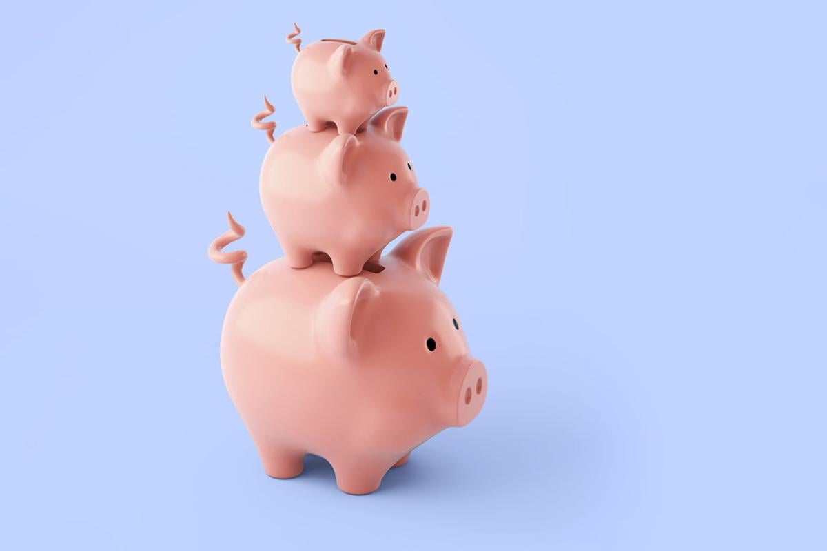 Three stacked piggy banks